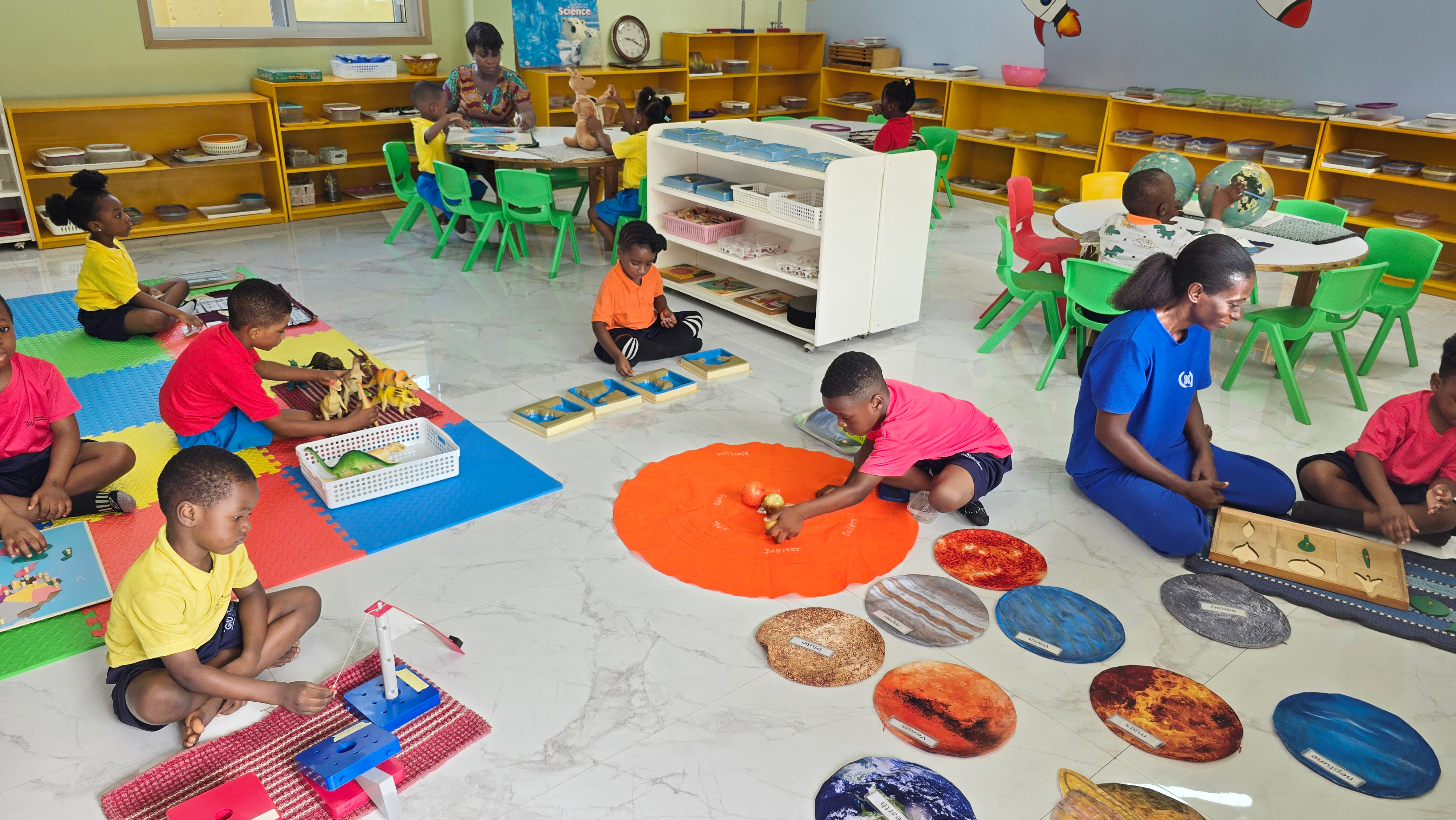 Children learning and exploring together in their classroom